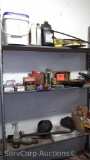 Lot on 3 Shelves of Measuring Tape, Staple Guns, Auto Parts, Welding Apron, Welding Curtain