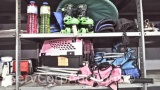 Lot on 2 Shelves Knee Pads, Roller Skates, Folding Chairs, Small Pet Travel Cage, Umbrellas