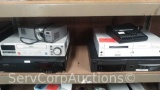 Projector, Micro Cassette Transcriber, VHS EP80 Printer, Go Video 4060 VHS Copier, VHS Players