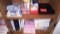 Lot on 2 Shelves of Paper Samplers, Booklets Samples, Photo Paper, Clip Boards, Binders