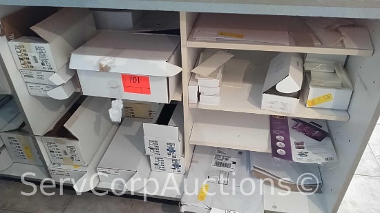 Lot in Cubby Holes of Laminating Punch Film, Binders, Laminating Pouches