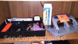 Lot on Shelf of Various Rubber Bands, Hole Punches, Tray Organizer