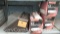 Lot on Shelf of 1 Outdoor Spot Light and 3 Indoor Emergency Lights