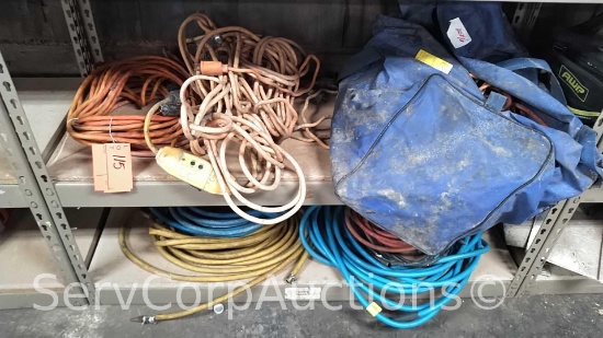 Lot on 2 Shelves of Extension Cords and Pneumatic Air Hoses