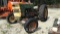 Long Tractor, Bad Starter Motor, Flat Driver Side Rear Tire & Needs New Rim, Major Play in Steering