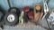 Lot on Shelf of Various 2-Wheel Dolly Tires, Flat Tire Repair Kits, Trailer Lights, Rachet Binder,