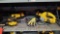 Lot on Shelf of DeWalt Electric Palm Sander-Works, DeWalt Electric Jigsaw-Works, Safety Glasses,