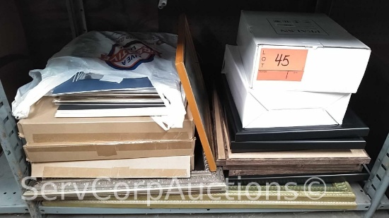 Lot on Shelf of Various Size Picture Frames, Photo Boundaries (Seller: City of Slidell)