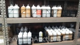 Lot on 2 Shelves of approx. 70 Condiment Squeeze Bottles with 17 Condiment Caddies