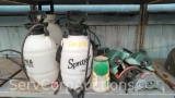 Lot on Shelf of Various Pump Sprayers, Water Hose Nozzles, Lawn Sprinklers