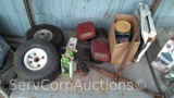 Lot on Shelf of Various 2-Wheel Dolly Tires, Flat Tire Repair Kits, Trailer Lights, Rachet Binder,