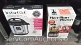 Lot on Shelf of Instant Pot 8-Quart Cooker, Hamilton Beach Food Processor