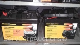 Lot on Shelf of 2 Renogy Sealed Universal 100AH 12-Volt Batteries inside of Minn Kota Industrial