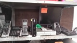 Lot on Shelf of Cordless Landline Phone, Monitor, Keyboard, PC Speakers, DVD Player, Router