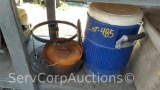 Lot on Shelf of Igloo Water Cooler, Umbrella Base, Texsport 4-Quart Cast-iron Pot, Burner