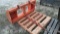 Lot on Pallet of Orange Hay Spear Skidsteer Attachment