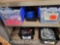 Lot on 2 Shelves of Condiment Caddies, Table Cloths, Place Mats & Utensils: Forks, Knives, Ladles,