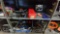 Lot on 2 Shelves of Various Floor Jacks, Lug Wrenches, Oil Funnels, Tow Hooks, Oil Wrenches, Oil