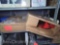 Lot on Shelf of 2 Grainger Red Hose Reels (Seller: City of Slidell)