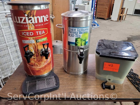 Lot on Shelf of Bunn Split Dispenser, Luzianne 5-Gallon Tea Urn, Counter Top Juice Dispenser