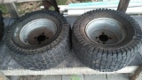 Lot on Shelf of Carlisle 20x10.00-10 4-Wheeler Tires with Rims (Seller: St. Tammany Parish Sheriff)