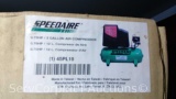 Lot on Shelf of Speedaire 3-Gallon Electric Air Compressor- New in Box, Packaging Damaged