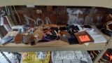 Lot on Shelf of Various Wallets, Magnet Trays, Wrist Bands, Knife Holder, Gun Holder, Glass Case,