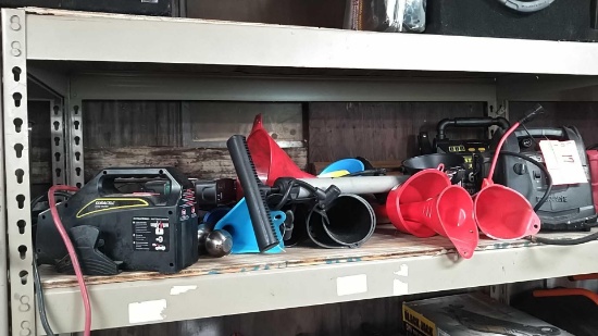 Lot on Shelf of Various Oil Funnels, Jump Boxes, Power Inverter, Bicycle Pump
