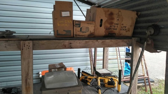 Lot on 2 Shelves of Hubbell Security Light, Various Flood Lights, Work Lights