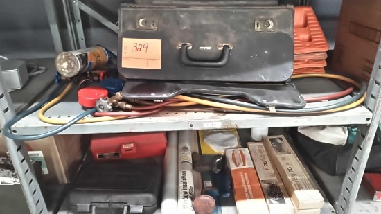 Lot on 2 Shelves of AC Guages, Music Sheets, Dremel, Rivet Clincher Kit, Window Shrink Film, Pre Log