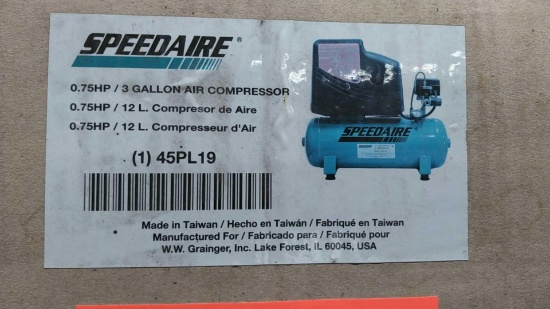 Lot on Shelf of Speedaire 3-Gallon Electric Air Compressor- New in Box, Packaging Damaged