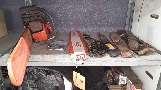 Lot on Shelf of Husqvarna Chainsaw, Various Chainsaw Bars, Chainsaw Chains, Lawnmower Blades