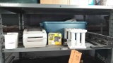 Lot on Shelf of Various Office Supplies: Hole Punch, Stapler, UPS Printers, Zip Disk