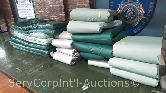 Lot of Approximately 21 Prison Bed Mattresses