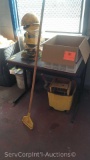 Lot of Small Desk with Contents of Hard Hats, Safety Vest, Rail Decor Connectors, Mop Bucket