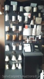 Justice Design Display with Various Wall Mount Light Fixtures