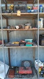 Lot on 4 Shelves of Various Ryobi Batteries, Starters, Work Light, EMT Fittings, Oil Filters, Air