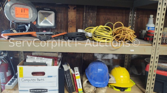 Lot on 2 Shelves of Various Extension Cords, Work Lights, Rubber Boots, Hard Hat, Manuals, DIY Books