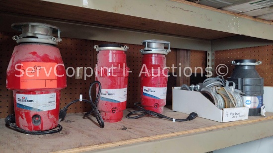 Lot on Shelf of Extra Disposal Flanges & 4 Food Waste Disposals: (1) Garrison 1/2-HP Mid Duty, (2)