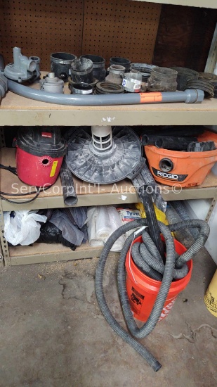 Lot on 3 Shelves of Various Rubber Pipe Sleeves, Work Cloths, Plastic Drop Cloth, Tyvek Suits, Rain