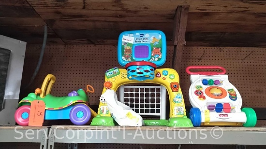 Lot on Shelf of Children's Toys