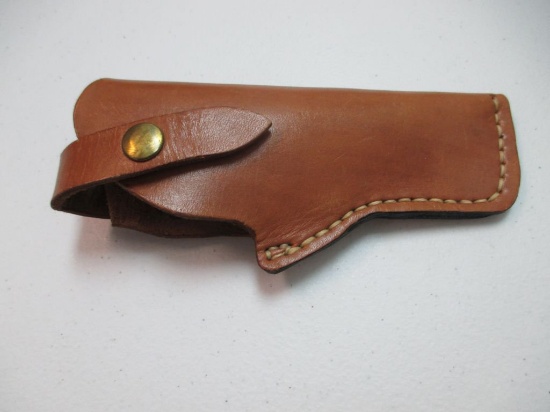 A-22 Like new Leather revolver holster. Looks to fit about a 4 or 5in barrel