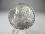 h-44 Choice Unc 1898-P Morgan Silver Dollar. Full mint luster on a well struck coin.