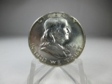 jr-90 1961 Choice Brilliant unc Franklin Silver Half Dollar. Full mint luster on a well struck coin
