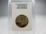 jr-202 2011 24KT Gold Enriched Kennedy Half Dollar. UNC Condition with Official Registration number