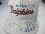 jr-57 Dan Marino and team Autographed MIAMI Dolphins Hat with COA. Nice clear signatures