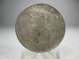 a-148 AU 1922-D Peace Silver Dollar