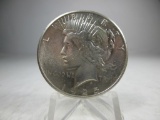 v-98 AU+ 1925-P Peace Silver Dollar