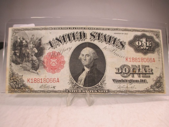 t-26 1917 $1 Red Seal Legal Tender Note. Fine condition, has folds and a minor edge split maybe a pi