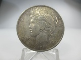 t-84 AU 1923 Peace Silver Dollar